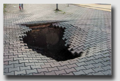 Unfortunately for the Commonwealth, not every hole in the street is this obvious.