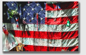 Celebrate and enjoy the 4th of July, honoring the purpose of the day. (Photo of flag hanging on the fence of St. Paul church, next to the World Trade Center, taken in spring 2002).