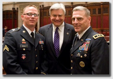 The man on the right is a corporal ... and a combat vet with a Purple Heart. The man on the right, a major general, is not a corporal. The guy in the middle is just a politician. But none of them is an incorporeal hereditament.