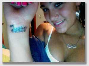 A Justin Bieber tattoo at age 13 would qualify as one ...