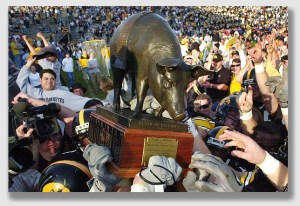 The Bronze Pig - who wouldn't bash heads together for 60 minutes of football over such a fetching trophy?